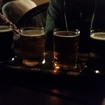 Taps & Apps - Flight of beers. - New American Near Me - Mililani, Hawaii