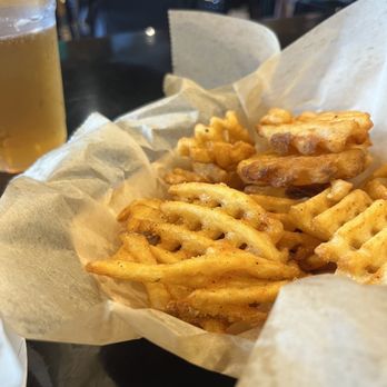 The Holler - Fries. They're pretty good. Crispy but not crunchy and well seasoned. - Burgers Near Me - Canton, Georgia