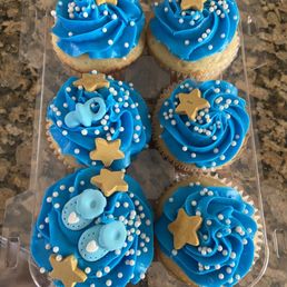 six cupcakes with blue frosting six cupcakes with blue frosting