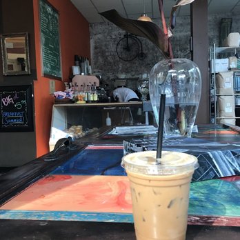 Cafe Argento - Cool vintage door acted as table - Coffee & Tea Near Me - Seattle, Washington