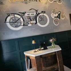 Sidecar - The Host's station with the name and logo of the restaurant in the background.