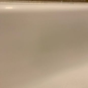 Sam's Bathtub Refinishing - You can see the patch where he didn't spray enough. It looks dingy and grey. He didn't want to re-do without being paid his total fee. - Refinishing Services Near Me - Pacoima, California Sam's Bathtub Refinishing - You can see the patch where he didn't spray enough. It looks dingy and grey. He didn't want to re-do without being paid his total fee. - Refinishing Services Near Me - Pacoima, California