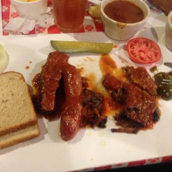 Mike Cotten's BBQ - (Rib, sausage link and brisket) side of beans. provide jalapeño, sliced onion, half pickle and sliced tomatoes. - Barbeque Near Me - Corpus Christi, Texas Mike Cotten's BBQ - (Rib, sausage link and brisket) side of beans. provide jalapeño, sliced onion, half pickle and sliced tomatoes. - Barbeque Near Me - Corpus Christi, Texas