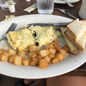 SeaCow Eatery - 2 egg omelette and home fries - American Near Me - Edisto Beach, South Carolina SeaCow Eatery - 2 egg omelette and home fries - American Near Me - Edisto Beach, South Carolina
