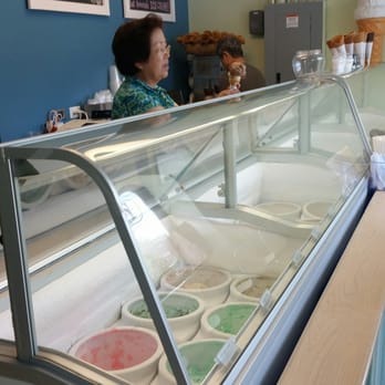 Elizabeth Creamery - She's admiring her own craft. Love it. - Ice Cream & Frozen Yogurt Near Me - Charlotte, North Carolina