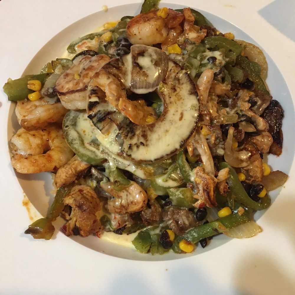 Terra Sur - a plate of food on a table - Mexican Near Me - Troy, Illinois Terra Sur - a plate of food on a table - Mexican Near Me - Troy, Illinois