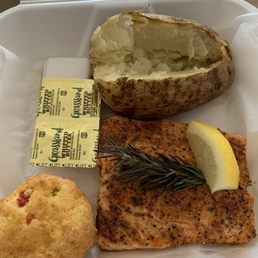 Salmon with baked potato and cornbread