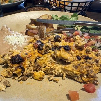 Palenque Kitchen - Pardon the partially eaten plate, but the chorizo with eggs was delicious. And some of the best refried beans I've had in a long time. - Cocktail Bars Near Me - Costa Mesa, California Palenque Kitchen - Pardon the partially eaten plate, but the chorizo with eggs was delicious. And some of the best refried beans I've had in a long time. - Cocktail Bars Near Me - Costa Mesa, California