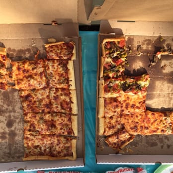 Kozy's Pizza - two slices of pizza in a box - Pizza Near Me - Mauston, Wisconsin Kozy's Pizza - two slices of pizza in a box - Pizza Near Me - Mauston, Wisconsin