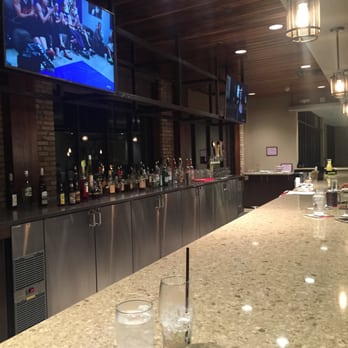Warehouse KiTChen + Cork - Long bar for cocktails - Cocktail Bars Near Me - Traverse City, Michigan