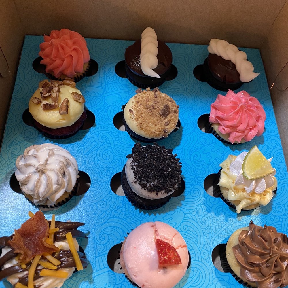 Men bidding on cakes and pies for charity, image size:1000x1000