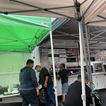 L&T Catering - The owner in his colorful shorts. Tarps are up to protect against the sun. Hard workers on site at 6:30 am. - Food Trucks Near Me - Ventura , California L&T Catering - The owner in his colorful shorts. Tarps are up to protect against the sun. Hard workers on site at 6:30 am. - Food Trucks Near Me - Ventura , California