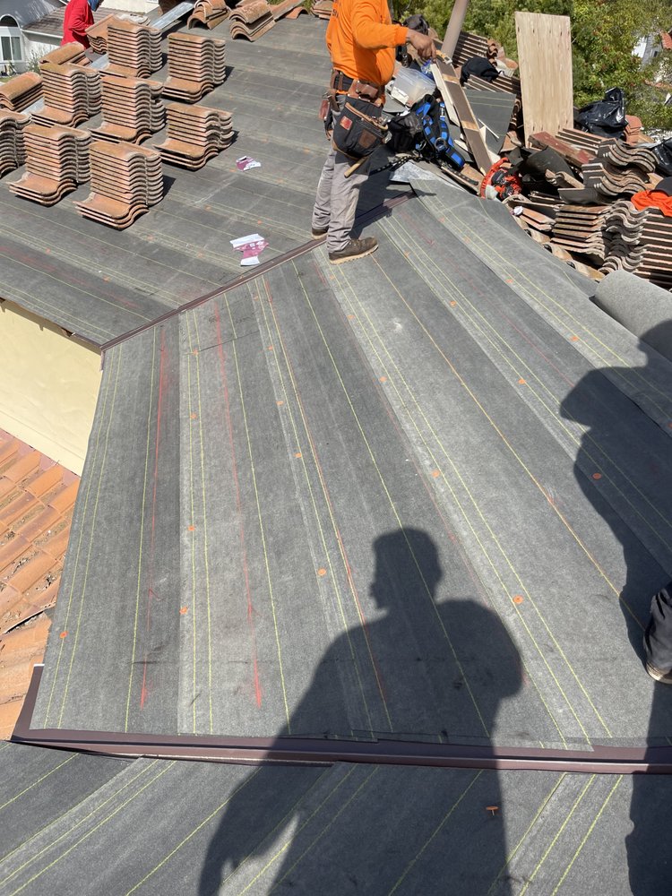 Slide of A&J's Professional Roofing