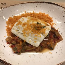 Bodega La Montaña - Bacalao (Cod) over Pisto (cooked mixed vegetables nicely seasoned) with spiced accompaniment