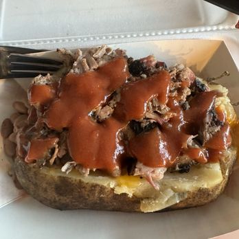 C&J Barbeque - Loaded baked potato with brisket with bbq sauce - Barbeque Near Me - Bryan, Texas