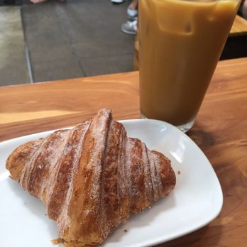 Intelligentsia Coffee - Churro croissant and cold brew with half and half - Coffee & Tea Near Me - Venice, California