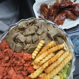 Combo Platter + Wings. Got the white sauce on the side. Combo Platter + Wings. Got the white sauce on the side.