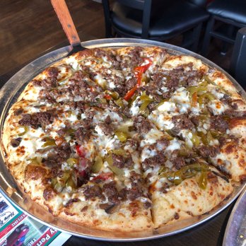 Fox's Pizza Den - a pizza on a pan - Pizza Near Me - Reynoldsville, Pennsylvania Fox's Pizza Den - a pizza on a pan - Pizza Near Me - Reynoldsville, Pennsylvania