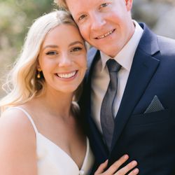 Lizzii Burnett - OK Falls wedding, Bride and Groom pose for couples portrait.