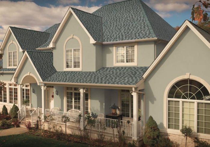 Slide of Extra Mile Roofing