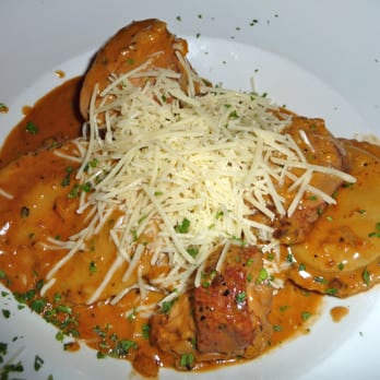 21 Steps Kitchen & Bar - pork tenderloin, mushroom ravioli, porcini cream sauce - YUM! - Steakhouses Near Me - Whistler, British Columbia
