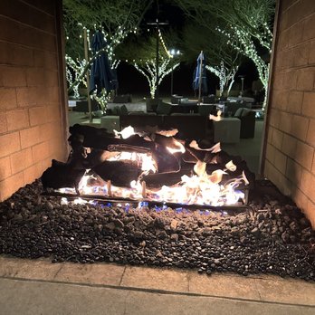 The Vic Bar + Kitchen - Fireplace outdoors that gives off a lot of heat! - New American Near Me - Buckeye, Arizona The Vic Bar + Kitchen - Fireplace outdoors that gives off a lot of heat! - New American Near Me - Buckeye, Arizona