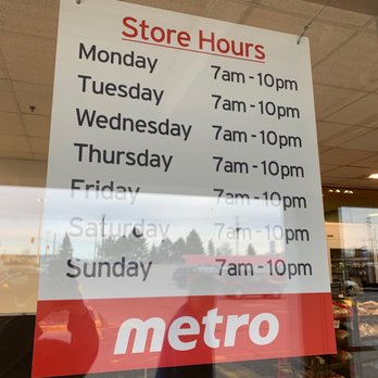 Metro - a store hours sign in a window - Grocery Near Me - Sarnia, Ontario Metro - a store hours sign in a window - Grocery Near Me - Sarnia, Ontario