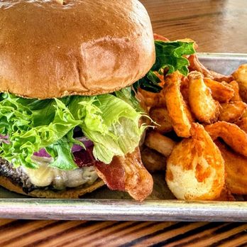 Rikki Tiki Tavern - Longboard Burger, impressive meat patty - Tiki Bars Near Me - Cocoa Beach, Florida