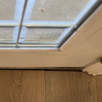 Russ Handyman And Construction - Significant gap between door and flooring, no caulking...nothing. - Handyman Near Me - Cave Creek, Arizona
