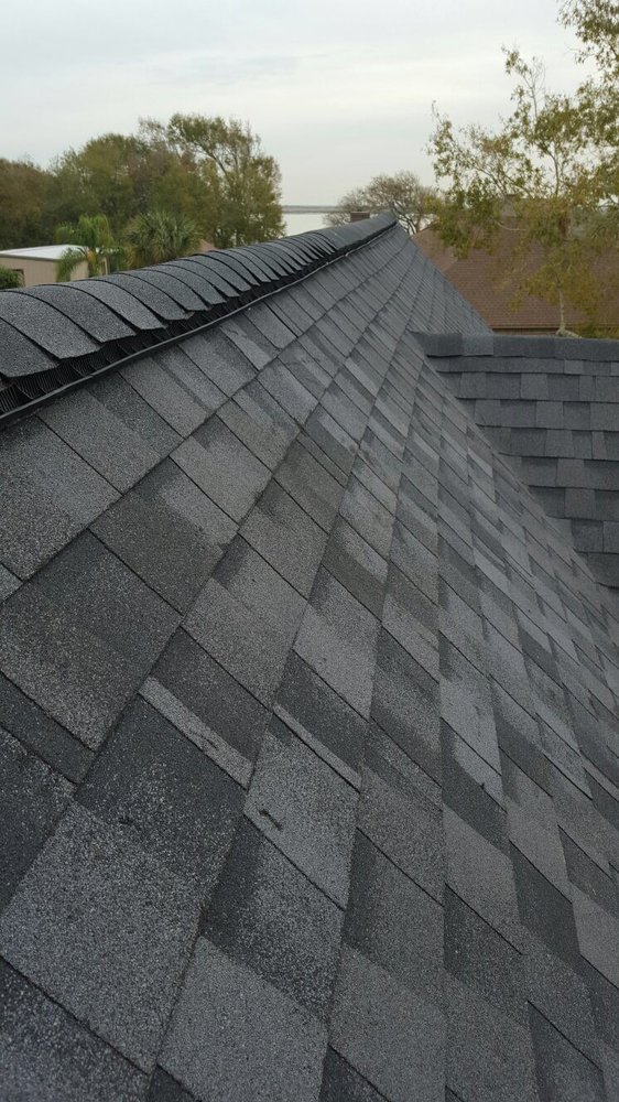 Slide of Champ Vision Roofing Services