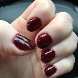 My "pro" manicure. Not pictured; my bleeding, swollen cuticles. This is after they finished drying and cleaning the nails...seriously.