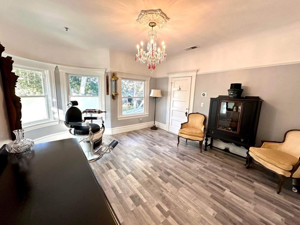 The Vintage Barberman Logo