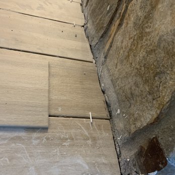 Rozak Flooring - a close up of a wooden floor - Flooring Near Me