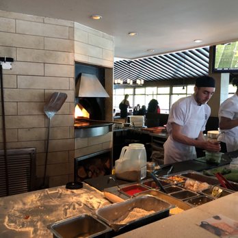 Earls Kitchen + Bar - Forno area - Canadian (New) Near Me - Vancouver, British Columbia Earls Kitchen + Bar - Forno area - Canadian (New) Near Me - Vancouver, British Columbia