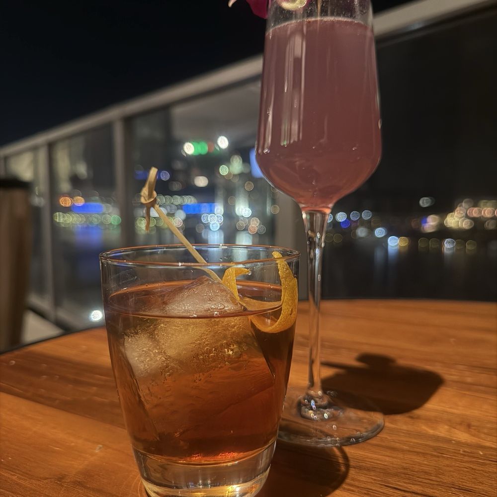 Lavender Rooftop Kitchen & Bar - Smoked Manhattan, and the Lavender 75. - Wine Bars Near Me - Savannah, Georgia