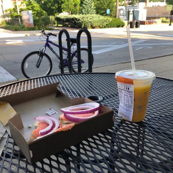 Einstein Bros. Bagels - a sandwich and a drink on a table - Bagels Near Me - Glen Ellyn, Illinois Einstein Bros. Bagels - a sandwich and a drink on a table - Bagels Near Me - Glen Ellyn, Illinois