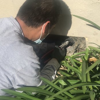 Carol Flynn Heating & Cooling - Luis, is doing precise trim work around the screen for clean reinstall and finishing with caulk work! - Heating & Air Conditioning/HVAC Near Me - Brisbane, California Carol Flynn Heating & Cooling - Luis, is doing precise trim work around the screen for clean reinstall and finishing with caulk work! - Heating & Air Conditioning/HVAC Near Me - Brisbane, California