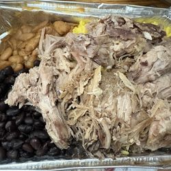 Mi Ecuador Juice Bar - Pork with yellow rice and beans.