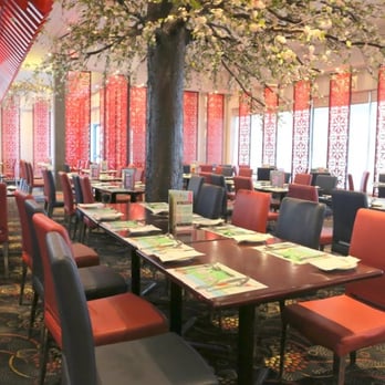 Mandarin Restaurant - tables and chairs with a tree in the middle of the room - Buffets Near Me - Rexdale, Ontario Mandarin Restaurant - tables and chairs with a tree in the middle of the room - Buffets Near Me - Rexdale, Ontario