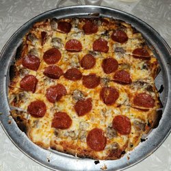 Pizza House - Large pepperoni, sausage and mushroom pizza