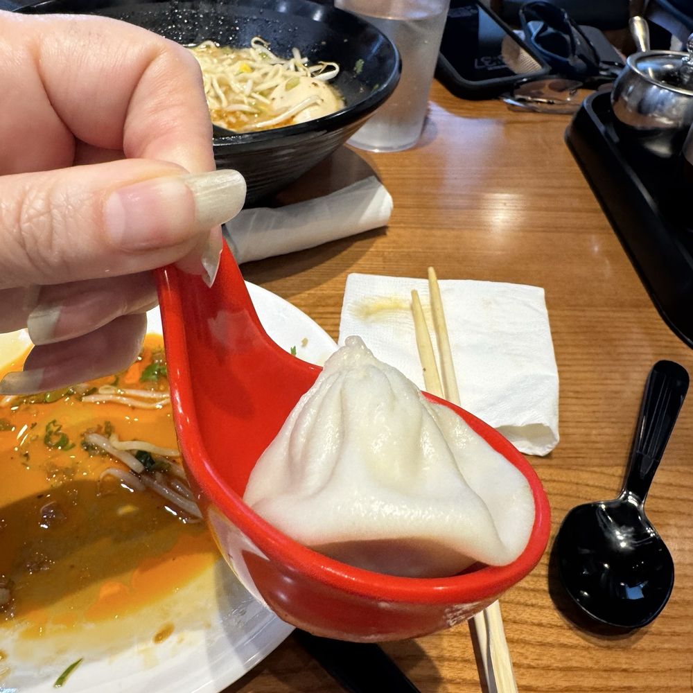 Soup dumpling on special spoon Soup dumpling on special spoon