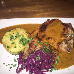 Pork Chop, Brandy and Pepper Sauce, a Colcannon Cake and Braised Red Cabbage