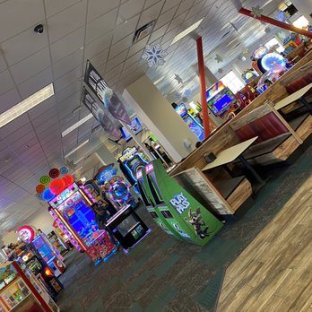 Chuck E. Cheese - a row of arcade machines - Arcades Near Me - Pompano Beach, Florida Chuck E. Cheese - a row of arcade machines - Arcades Near Me - Pompano Beach, Florida