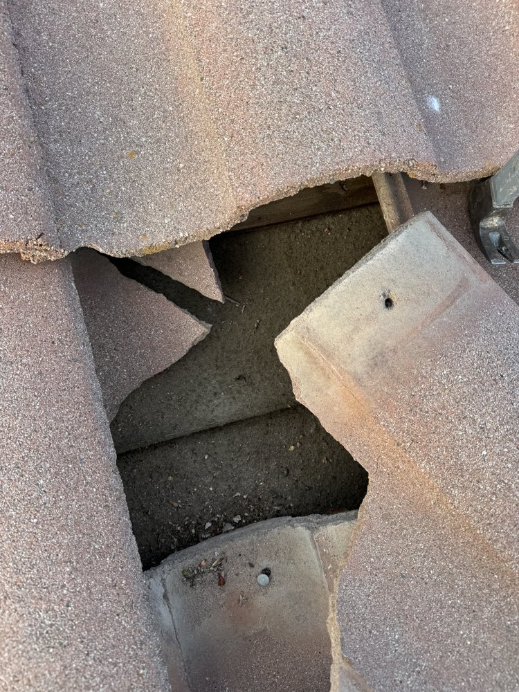 Slide of LXS Roofing