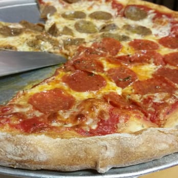 Rocco's Pizza Restaurant - NY hand tossed style - Pizza Near Me - Spring Hill, Florida Rocco's Pizza Restaurant - NY hand tossed style - Pizza Near Me - Spring Hill, Florida