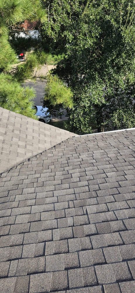 Slide of CM Roofing Pros