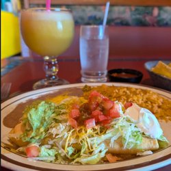Chicken chimichanga and blended mango margarita