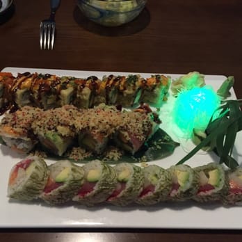 Sushi Yu - From the top: Sunset Roll, Sexy Lady, and Dolphin Roll! Not to mention their signature flashing display on each plate! - Japanese Near Me - Kennesaw, Georgia Sushi Yu - From the top: Sunset Roll, Sexy Lady, and Dolphin Roll! Not to mention their signature flashing display on each plate! - Japanese Near Me - Kennesaw, Georgia
