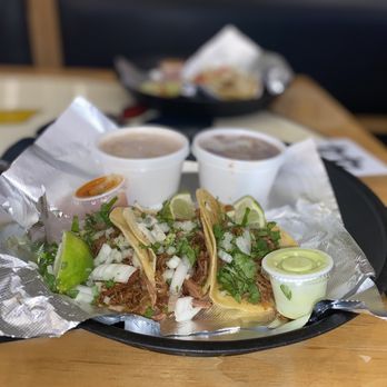 Locos Tacos & Bar - Carnitas Street Tacos with rice and beans. - Tacos Near Me - Tallahassee, Florida