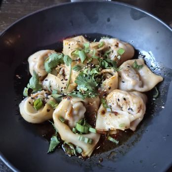 Feast - Artisan Dumpling and Tea House - Chicken wontons in spicy sauce - Chinese Near Me - Madison, Wisconsin Feast - Artisan Dumpling and Tea House - Chicken wontons in spicy sauce - Chinese Near Me - Madison, Wisconsin